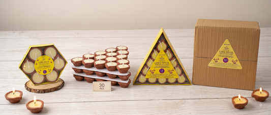 Four different pack sizes of cow ghee diyas arranged together showing quantity and size comparison