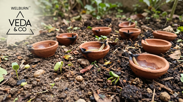 Biodegradable clay cow ghee diyas from Veda & Co shown in an eco-conscious context — Veda & Co