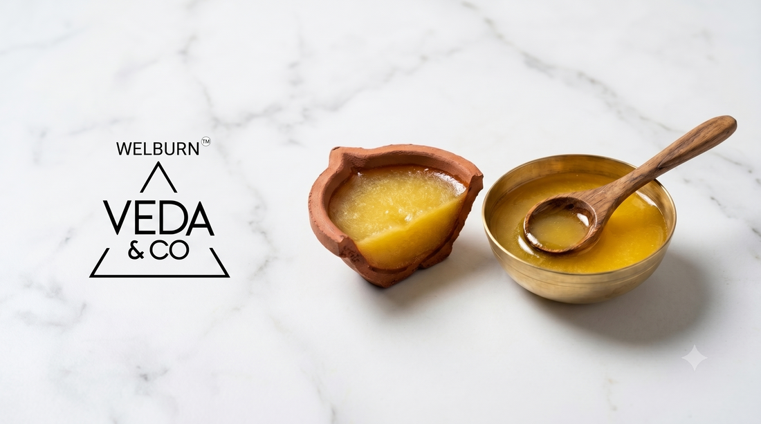 Veda & Co pure cow ghee clay diya with golden ghee visible against a clean white background