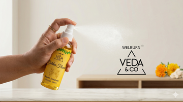 Veda & Co puja spray being used as a home fragrance spray in a living room — Veda & Co